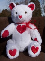 Juliet | Handmade custom teddy bear showing love with lots of hearts and a monogram