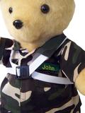Duty Bear in camel fur, showing off his name badge