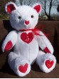 Juliet | Handmade custom teddy bear showing love with lots of hearts and a monogram