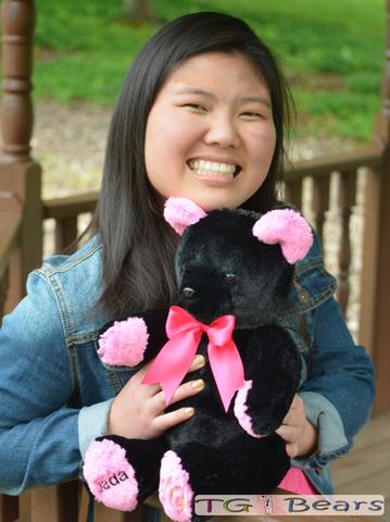 Ramona Bear with Jada wearing a jacket