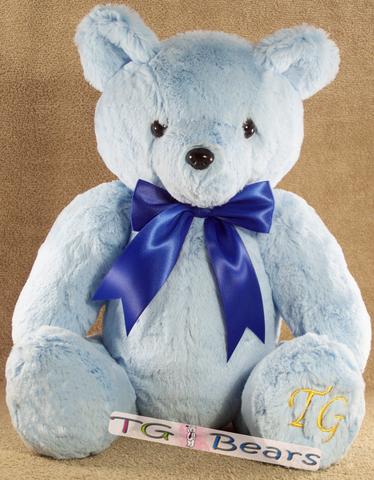 Bubblegum Bear is a handmade teddy bear in the softest pastel blue fur.